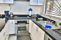 Casa Bruna: A 4-bedroom home located in a gated community with a tennis court in Potrero. thumbnail