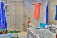 Casa Bruna: A 4-bedroom home located in a gated community with a tennis court in Potrero. thumbnail