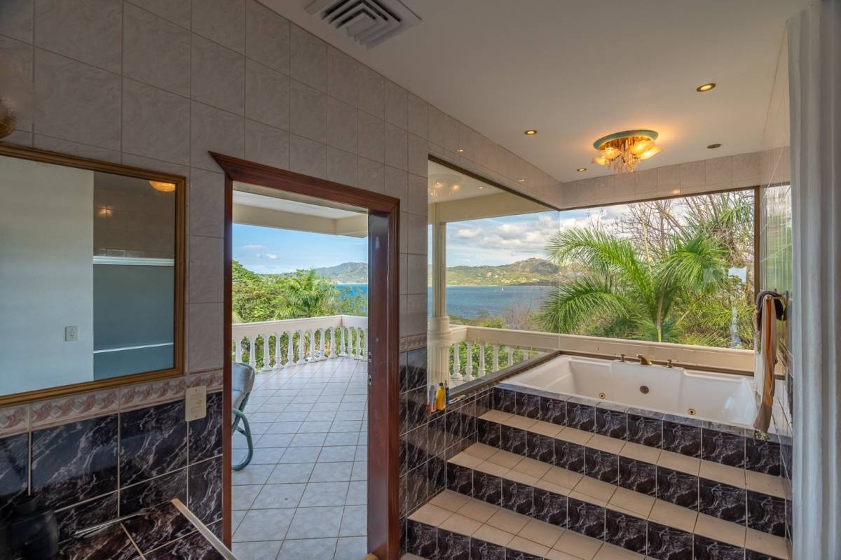 Titled Oceanfront Lot with Year-Round Sunset Views in Playa Flamingo