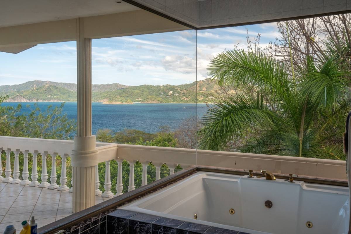 Titled Oceanfront Lot with Year-Round Sunset Views in Playa Flamingo