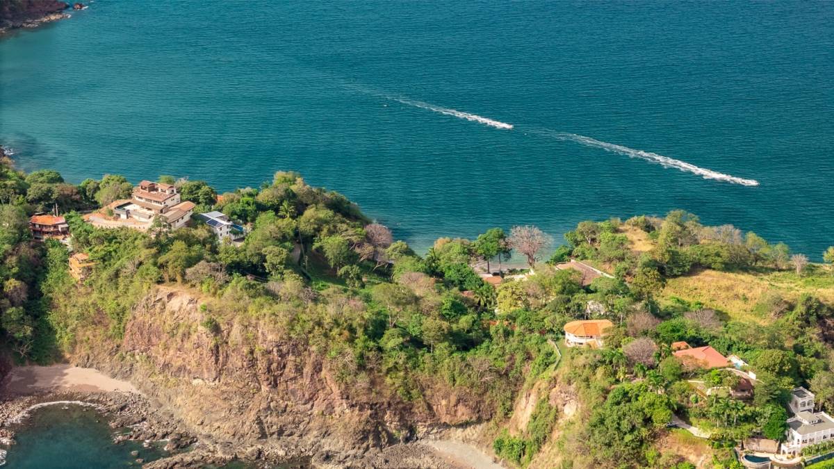 Titled Oceanfront Lot with Year-Round Sunset Views in Playa Flamingo