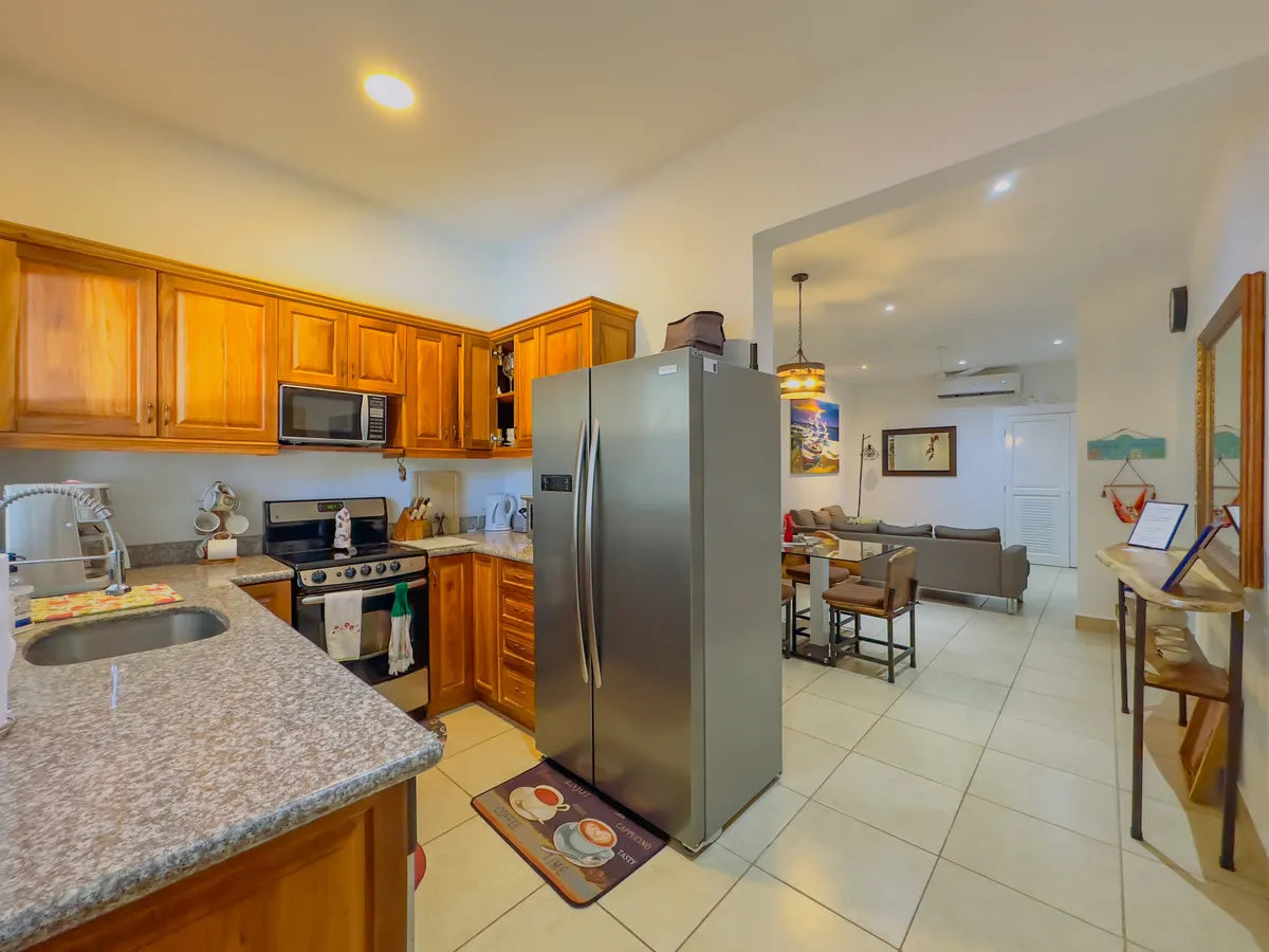 Paradizio 208 – Covered Parking Included | Walk to Beach & Town