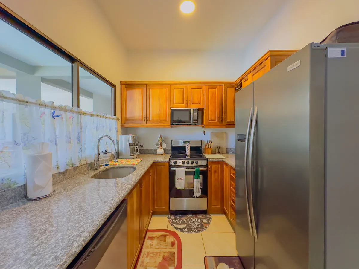 Paradizio 208 – Covered Parking Included | Walk to Beach & Town