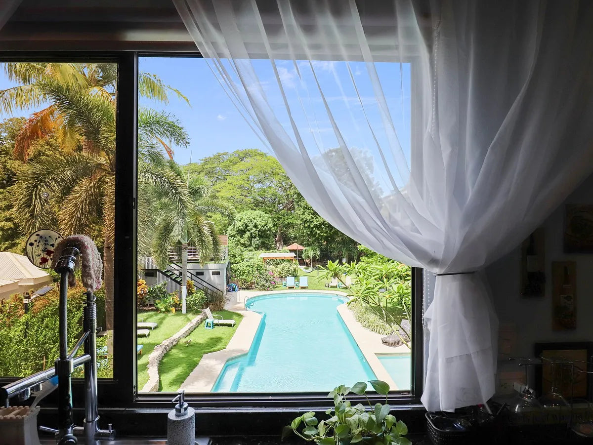 Paradizio 209 | Spacious 2-Bedroom Condo Steps from Beach & Town