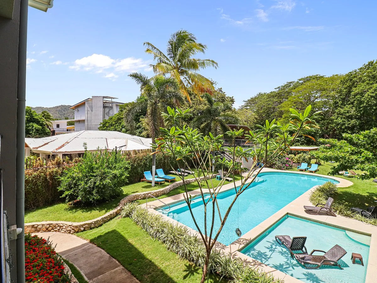 Paradizio 209 | Spacious 2-Bedroom Condo Steps from Beach & Town