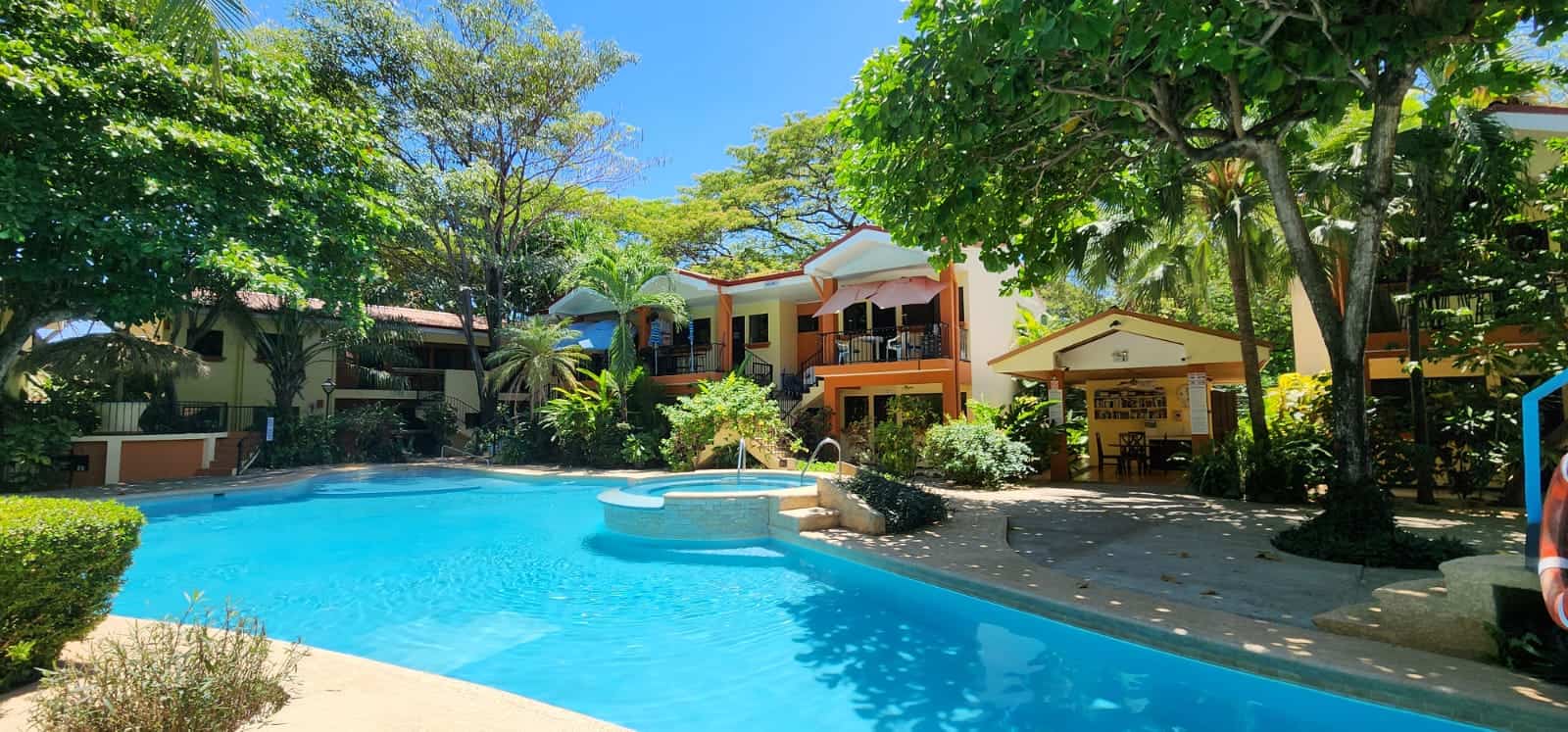 Cocomarindo #14 – Titled 2BR Condo Near the Beach | Low HOA | Gated Community