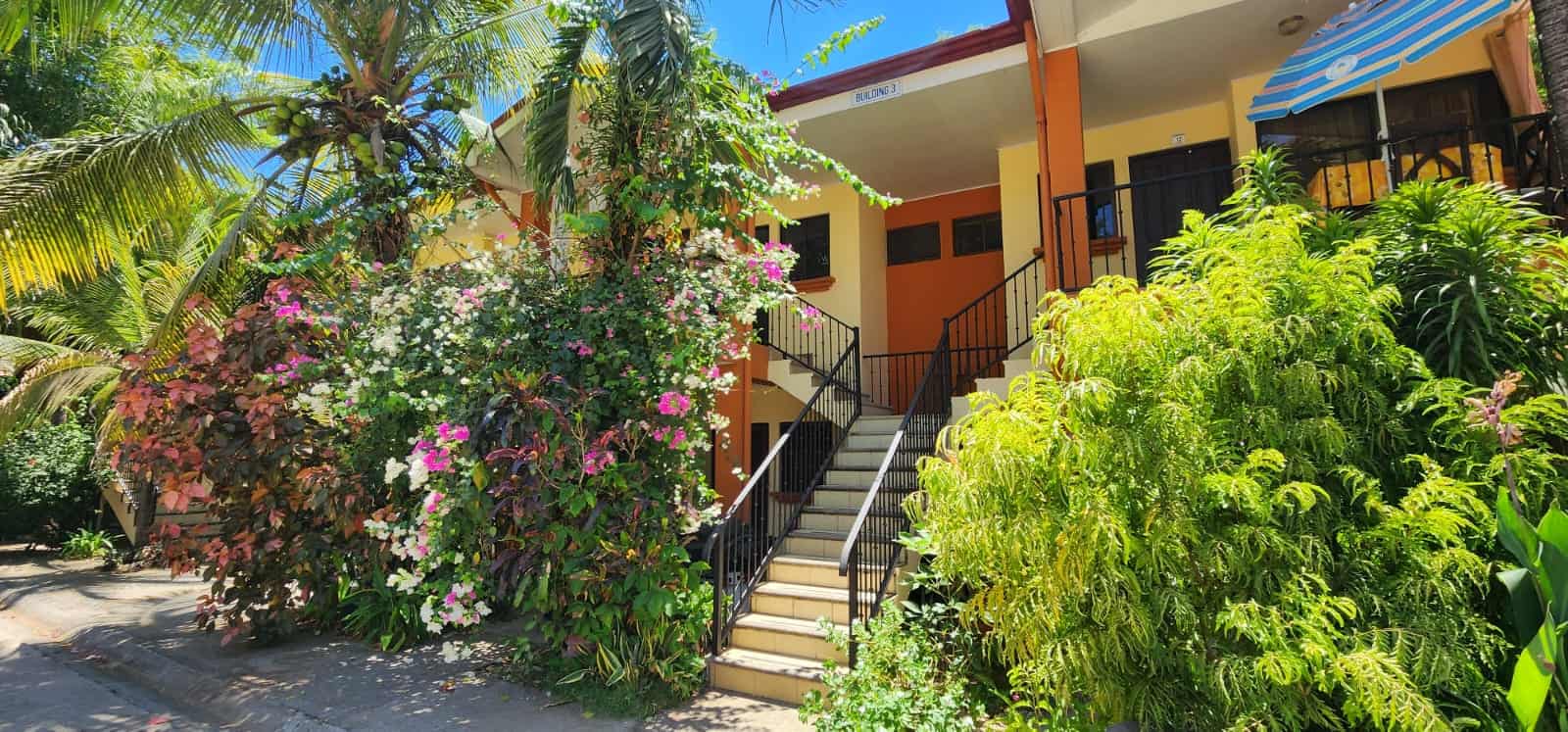 Cocomarindo #14 – Titled 2BR Condo Near the Beach | Low HOA | Gated Community