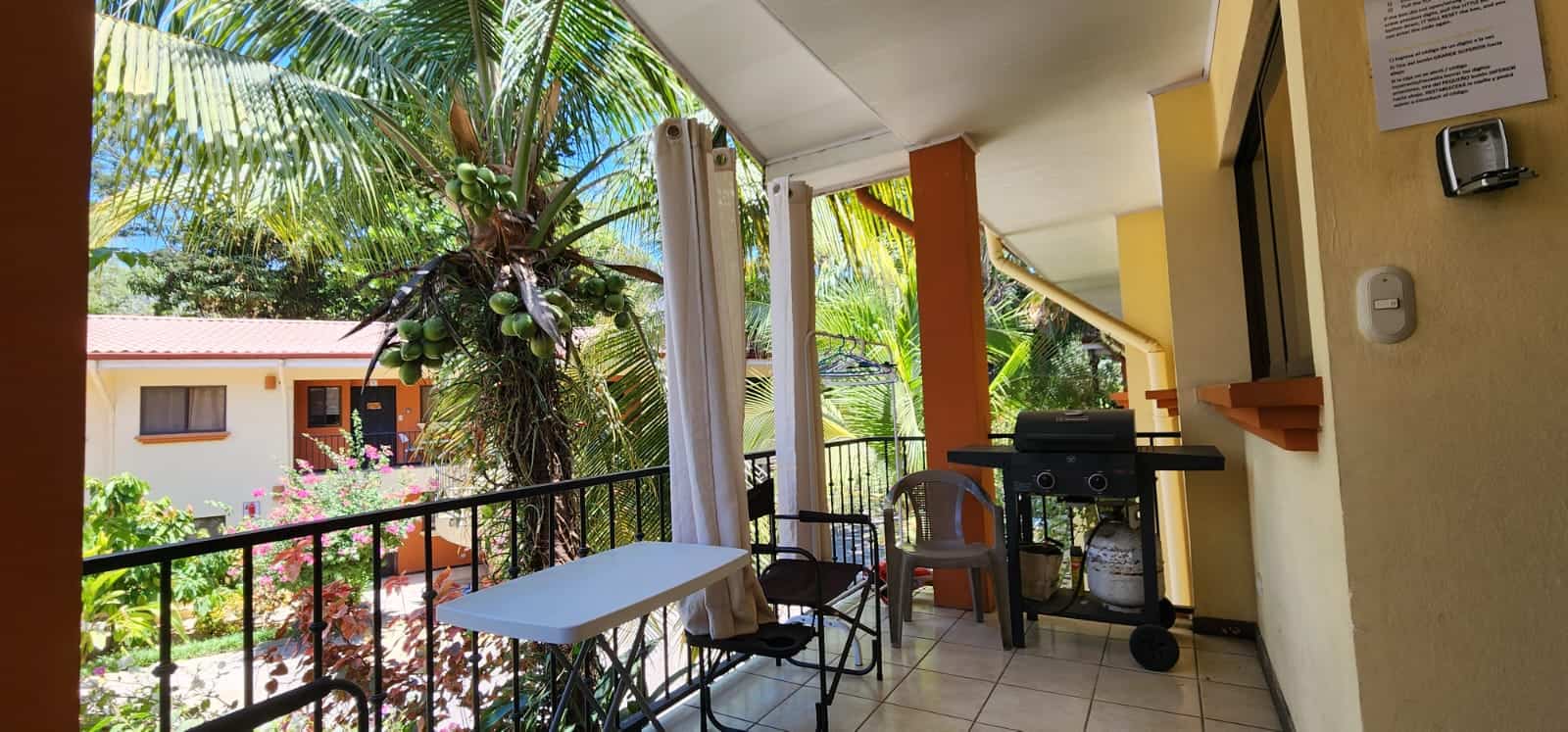Cocomarindo #14 – Titled 2BR Condo Near the Beach | Low HOA | Gated Community