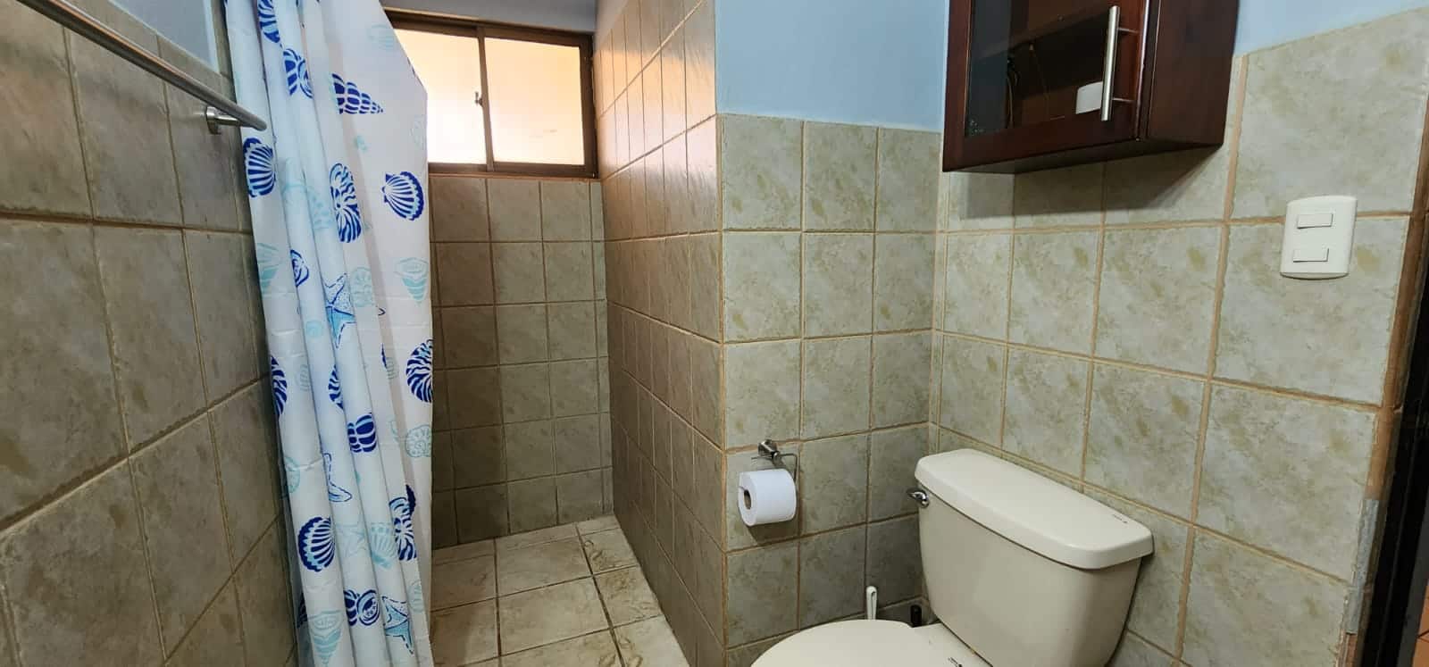 Cocomarindo #14 – Titled 2BR Condo Near the Beach | Low HOA | Gated Community