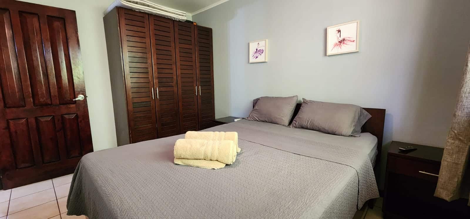 Cocomarindo #14 – Titled 2BR Condo Near the Beach | Low HOA | Gated Community