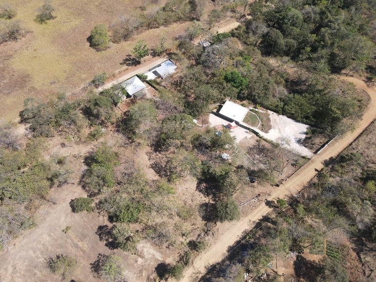 Discover the land of your dreams, complete with full plans for a stunning three-bedroom home!