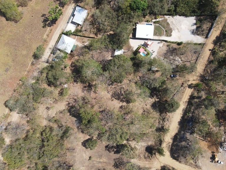 Discover the land of your dreams, complete with full plans for a stunning three-bedroom home!