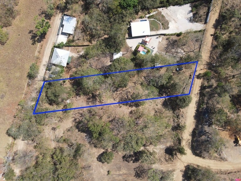 Discover the land of your dreams, complete with full plans for a stunning three-bedroom home!