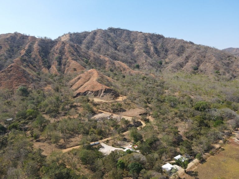 Discover the land of your dreams, complete with full plans for a stunning three-bedroom home!