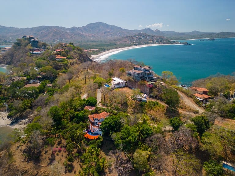 Stunning Ocean View Lot: Prime Playa Flamingo Location with Water and Ready for Construction!