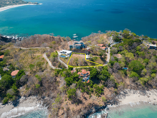 Stunning Ocean View Lot: Prime Playa Flamingo Location with Water and Ready for Construction!