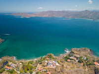 Stunning Ocean View Lot in Playa Flamingo: Ready to Build with Water Access! thumbnail