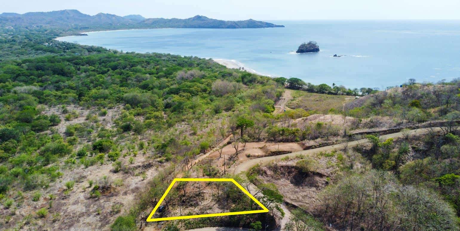 1/4 Acre lot only steps away from a pristine undiscovered beach near Flamingo: Prime Coastal Parcel