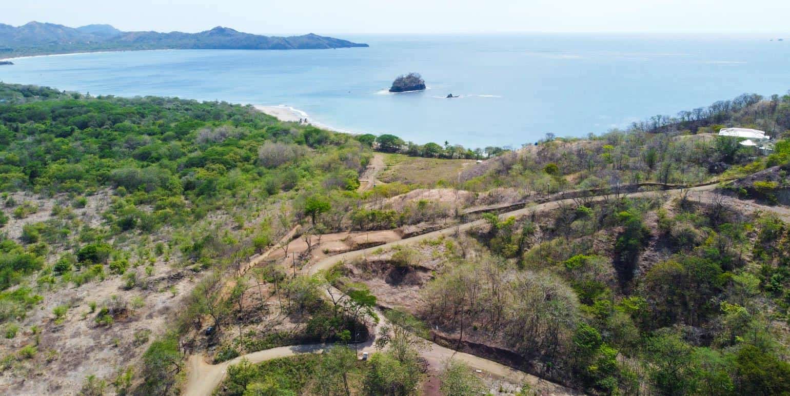 1/4 Acre lot only steps away from a pristine undiscovered beach near Flamingo: Prime Coastal Parcel